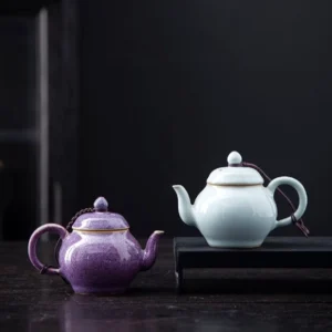 front view of 100ml small ceramic teapot with infuser