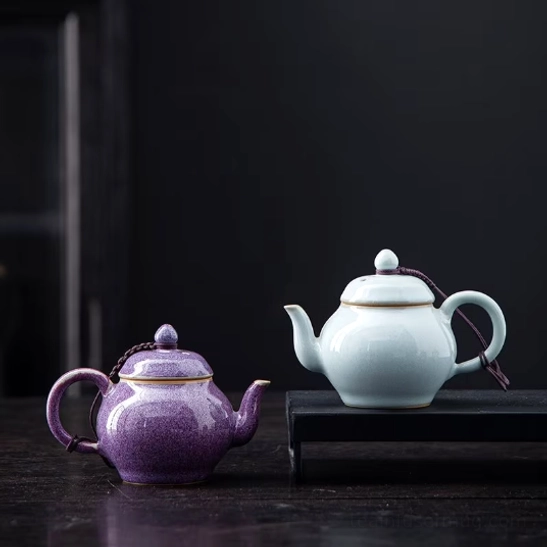 front view of 100ml small ceramic teapot with infuser