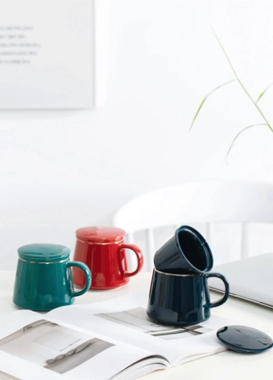 Size comparison of 10oz 300ml minimalist ceramic tea infuser mug with a smartphone