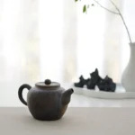 full side view of 110ml antique ceramic teapot with infuser