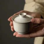 full three-piece view of 120ml cream ceramic gaiwan tea cup with natural texture