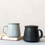 12oz ceramic tea infuser mug both matte black and glossy gray color options displayed