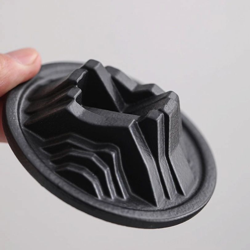 size comparison of 12oz mountain glass tea infuser mug held in a hand