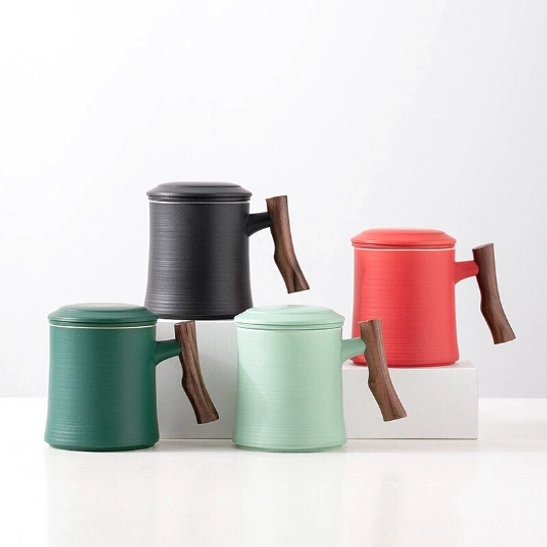 Full side view of 13oz ceramic tea mug with wooden handle and infuser