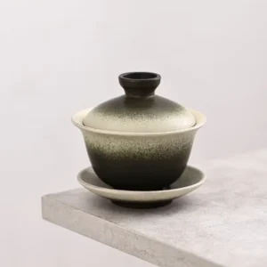 140ml green speckled porcelain gaiwan with three parts on wooden background