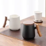 full assembled view of 14oz ceramic tea infuser mug with wooden handle