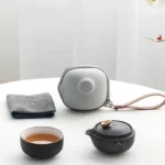 fully opened 150ml black ceramic travel tea set with all components