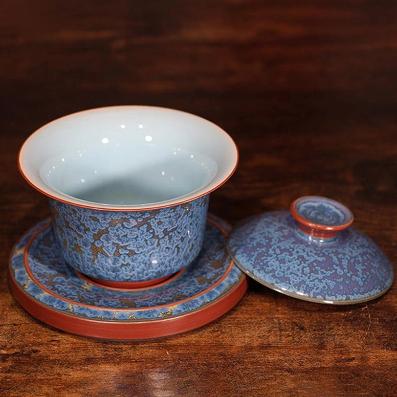 top view of open 160ml blue jun kiln gaiwan showing interior