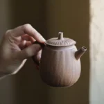 Full side view of 160ml vintage Chinese clay teapot with infuser