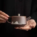 front view of 180ml faraway mountain ceramic teapot with infuser