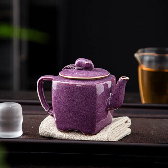 side view of 180ml square purple ceramic teapot with infuser