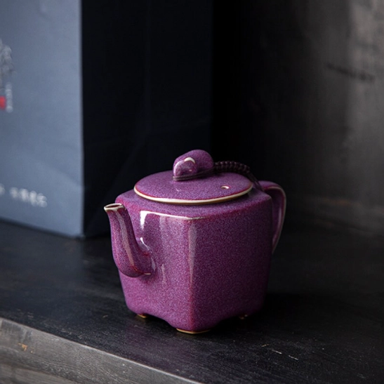 top view of 180ml square purple ceramic teapot showing lid and knot
