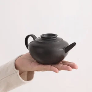 full view of 200ml black ceramic teapot with infuser