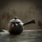 full side view of 200ml dark ceramic kyusu teapot with infuser