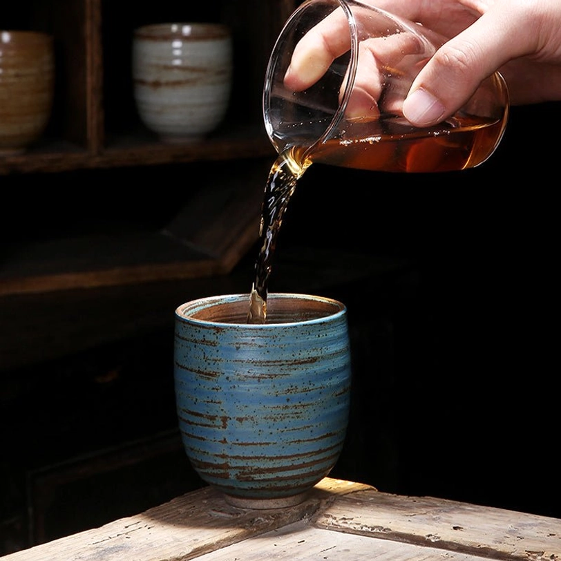 200ml Japanese ceramic tea cup filled with steeped green tea