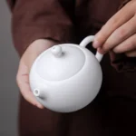 front view of 200ml mutton fat jade ceramic teapot with infuser