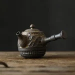 full side view of 200ml retro side handle teapot with infuser bronze textured