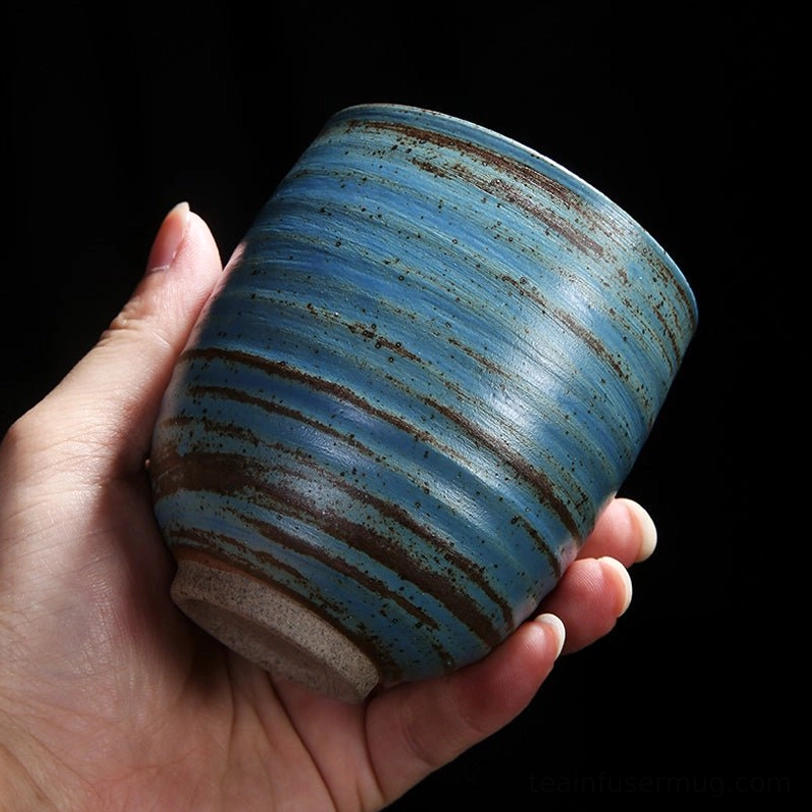 side profile of rustic 200ml Japanese ceramic tea cup showing texture