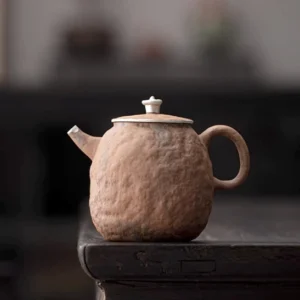 220ml Jingdezhen rough pottery teapot with 999 silver accents full view