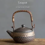 225ml hammered ceramic teapot with wicker handle front view