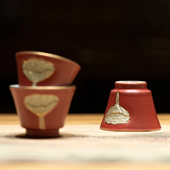 size comparison of the 23ml chinese lotus tea cup with a coin