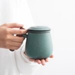 full view of 350ml minimalist ceramic tea infuser mug with wood handle