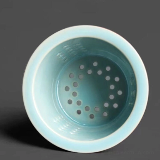 open 380ml blue gold speckled ceramic tea infuser mug with lid removed