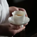 full set view of 60ml petal edge chinese white porcelain tea cup and saucer