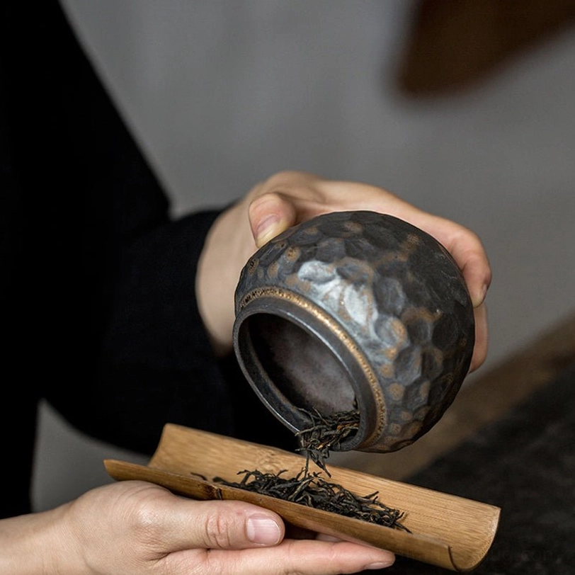 airtight ceramic tea storage canister on a neutral background