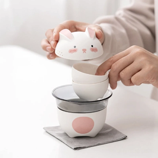 all components of 120ml cute portable travel tea set laid out