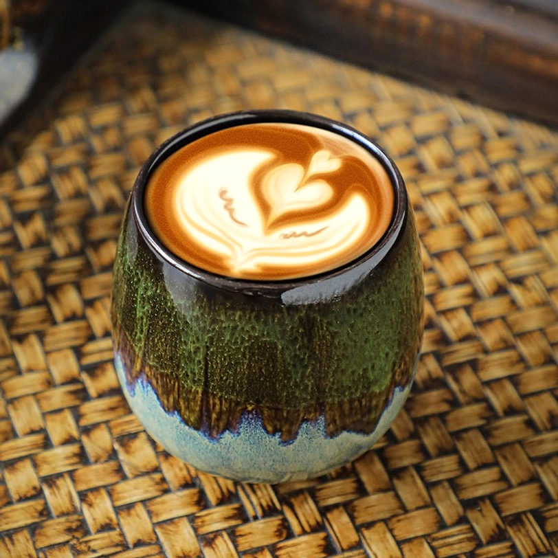 four different styles of jian zhan ceramic tea cups