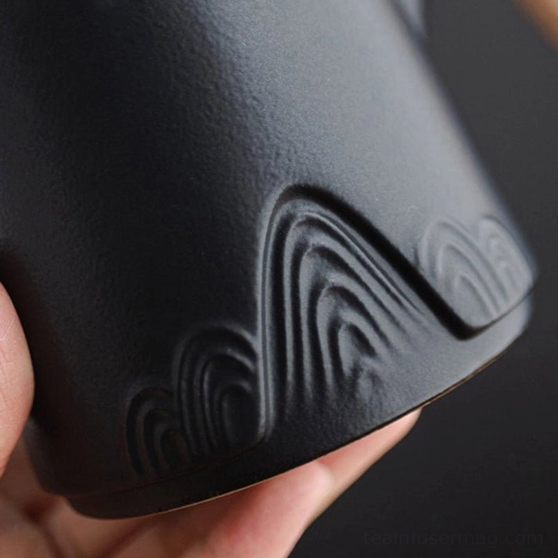 all three color options blue green black ceramic tea infuser mugs displayed