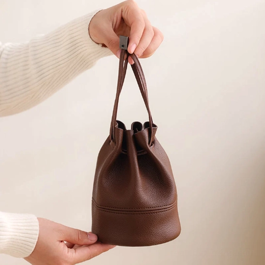 all pieces of beige travel tea set spread out for display
