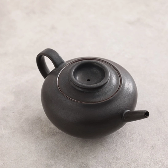 bottom view of black ceramic gongfu teapot
