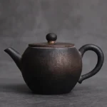 full side view of 150ml black ceramic teapot with infuser