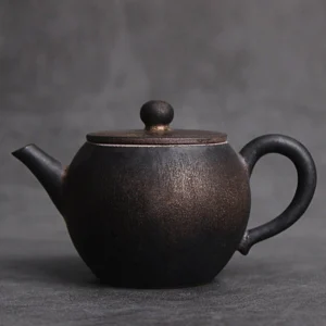 full side view of 150ml black ceramic teapot with infuser
