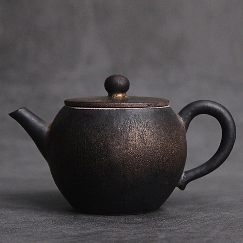 full side view of 150ml black ceramic teapot with infuser