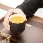 black chinese porcelain tea cup 200ml with fu character relief full view