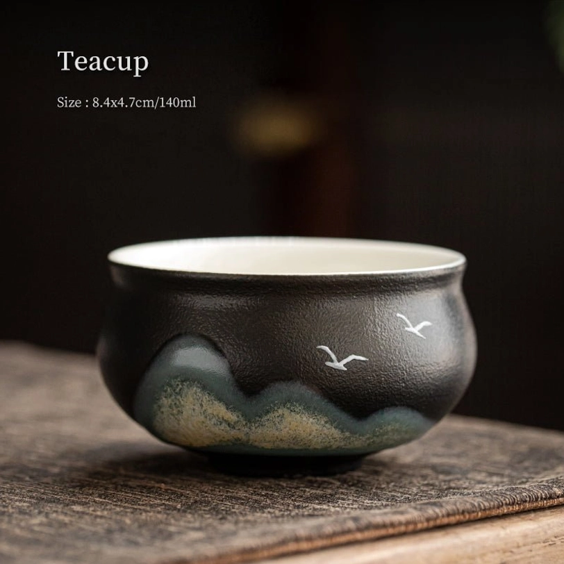 top view of black ceramic chinese tea cup showing white inner wall