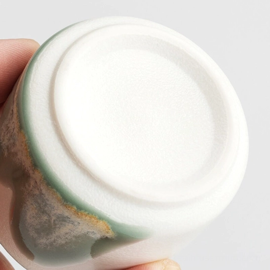 Black 70ml ink mountain Chinese ceramic tea cup side view