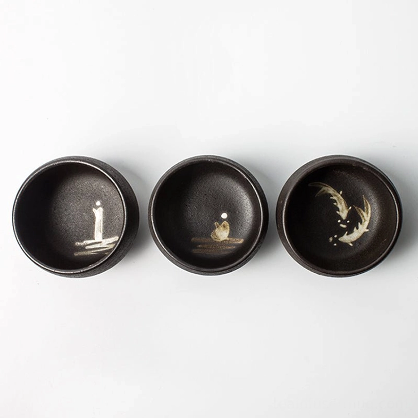 matte black japanese ceramic tea cup full exterior view