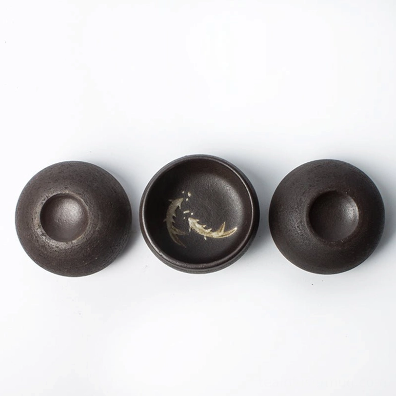 black japanese ceramic tea cup size reference next to tea pot