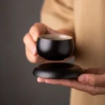 50ml textured black Japanese tea cup with matching saucer product overview