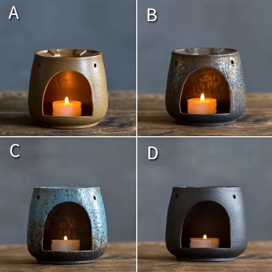 black kyusu teapot with infuser on ceramic candle warmer