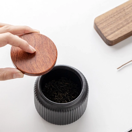 black to white gradient ceramic tea storage canister front view