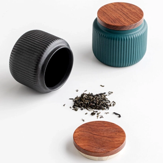 blue ceramic compact tea storage canister with vertical rib texture