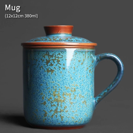 side view blue gold speckled ceramic tea infuser mug with infuser and lid