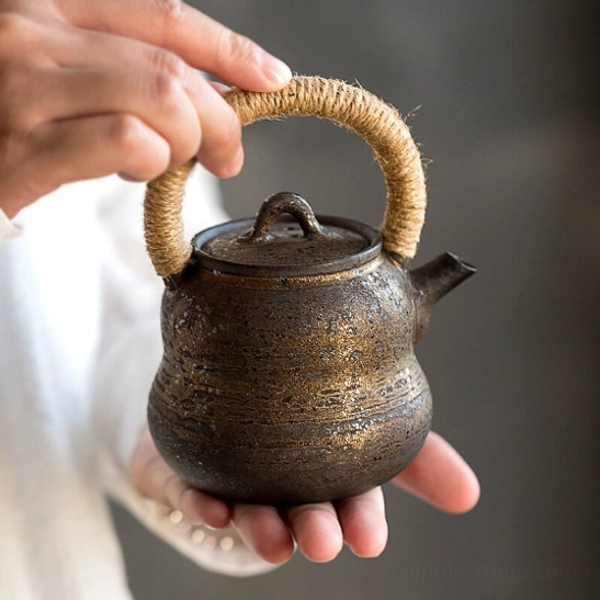 top view of blue gourd ceramic teapot showing infuser opening