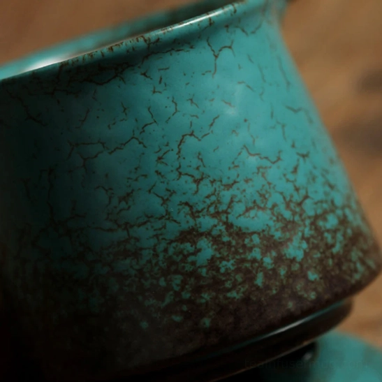 bottom view of blue-green crackle glaze kyusu teapot