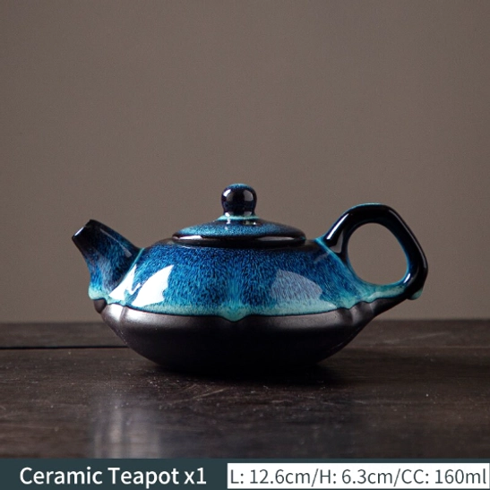angle view of ergonomic handle of blue Jian Zhan teapot